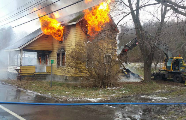 Vacant house burns across from Cortlandville Fire station